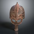 Ancient Metal Weapon Helmet Design With Intricate Patterns And Spiked Top