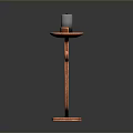 Copper Candle Holder With White Candle And Curved Decorative Design