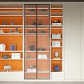 Modern Bookcase With Glass Doors And Orange Shelves Displaying Decorative Items Tea Sets And Books