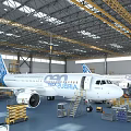 Inside Airport Maintenance Hangar With Airbus Aircraft And Repair Equipment