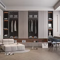 Modern Walk-in Closet Interior With Storage Cabinets Hanging Clothes Seating Area And Herringbone Wood Floor