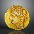 Ancient Gold Coin Featuring Head With Curly Hair Headdress And Golden Surface