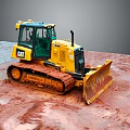 Yellow CAT Bulldozer With Tracks And Blade On Red Soil Ground