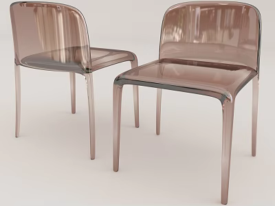Two Transparent Amber Leisure Chairs With Sleek Design And Slim Legs 3d model
