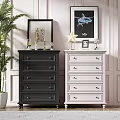 Stylish Black and White Dressers with Decorative Items Wall Art and Potted Plant