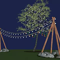 Outdoor Night Decor Scene With Tree String Lights Wooden Tripods Colorful Decorations Grass And Stones