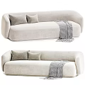 Modern Two Seater Sofa In Gray And Light Beige With Soft Cushions And Checkered Blanket
