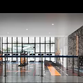 Spacious Gym Interior With Fitness Equipment And Large Windows