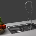 Stainless Steel Double Bowl Kitchen Sink With Pull Down Faucet And Fresh Fruits On Countertop