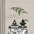 Fern Bonsai Plant Decor With Black Meditating Statue On Books And Marble Base