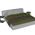 Comfortable Double Bed With Soft Mattress Green Duvet White Pillows And Nightstand