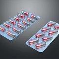 Red And Silver Capsule Blister Packs Medical Packaging On Dark Background