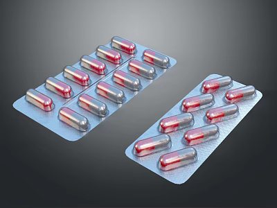 Red And Silver Capsule Blister Packs Medical Packaging On Dark Background 3d model