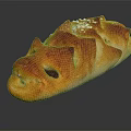 Artisan Braided Bread With Golden Brown Crusty Surface Topped With Sesame Seeds And Raisins