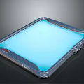 Modern Computer Touchpad Featuring Blue Glowing Surface And Silver Frame