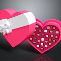 Open Pink Heart Shaped Box Filled With Small Square And Heart Shaped Chocolates