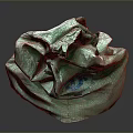Pile Of Crumpled Green Woven Sacks With Textured Fabric And Used Appearance