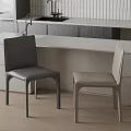 Modern Kitchen Interior With Black And Beige Dining Chairs And White Countertop