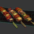 Three Roasted Pork Belly Skewers On Black Slate Plate With Glossy Surface