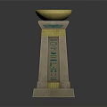 Egyptian Style Stone Pillar With Golden Bowl Top And Intricate Hieroglyphic Decorations