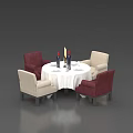 Round Dining Table Set With White Tablecloth Tableware Wine Glasses Candles And Red Beige Chairs