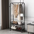 Modern Standing Clothes Rack With Hanging Clothes White Handbag Brown Tote Shoes And Towel Basket