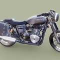 Vintage Black Motorcycle With Spoke Wheels Headlight Exposed Engine And Leather Saddlebag