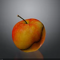 Fresh Ripe Red and Yellow Apple with Stem on Reflective Dark Surface