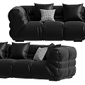 Black Sectional Sofa with Multiple Black Cushions and White Accent Pillows in Modern Leather Design