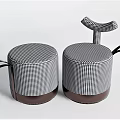 Round Ottoman Stools Featuring Black And White Checkered Design Brown Base And Leather Strap 3d model
