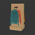 Wooden Display Rack With Blue And Orange Hoodies On Stand
