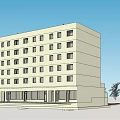 Multi Story Apartment Building Exterior With Balconies And Trees Under Blue Sky
