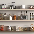 Organized Kitchen Shelves With Assorted Glass Spice Bottles And Condiment Jars