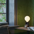 Cozy Desk Setup With Green Wall Window Potted Plant Table Lamp Open Book And Shelves