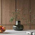 Green Glass Vase with Floral Branches on White Table Wooden Wall Background