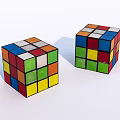 Two Vintage Colorful Rubiks Cubes With Multicolored Squares On White Background