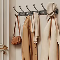 Wall Mounted Metal Hook in Entryway with Hanging Brown Bag Jacket Scarf and Hat