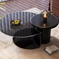 Modern Black Coffee Table With Glass Top Metal Lamp Open Book And Fruit Tray