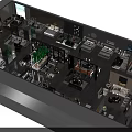 Aerial View of Modern Interior Space with Display Areas Greenery Digital Screens and Seating Sections
