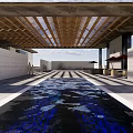 Modern Sales Office Building Featuring Wooden Roof Water Pool And Natural Light