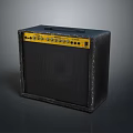 Black Electric Guitar Amplifier With Yellow Control Panel And Knobs Handle