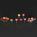 Colorful Swirl Lollipops With Various Colors Arranged On Black Background With Reflection
