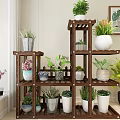 Decorative Multi tier Wooden Plant Shelf With Colorful Potted Flowers And Green Plants