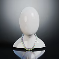 Colorful Beaded Necklace On White Mannequin Neck With Dark Background Reflection