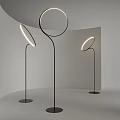 Sleek Modern Floor Lamp Featuring Circular Light Ring And Black Metal Stand In Minimalist Interior