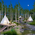 Night Park Landscape With White Tepees Tall Trees Moonlit Stream And Wooden Decks