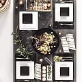 Modern Black White Dinnerware Set For Table Setting With Yellow Fruits Green Plants And Cutlery