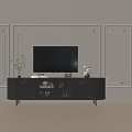 Elegant Black TV Stand With Flat Screen TV Green Plant And Statue On Decorative Wall