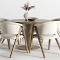Round Dining Table with White Chairs Vase and Bowl on Top Surface 3d model