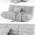 Gray Velvet Sectional Sofa With Green Pillow And Gray Blanket